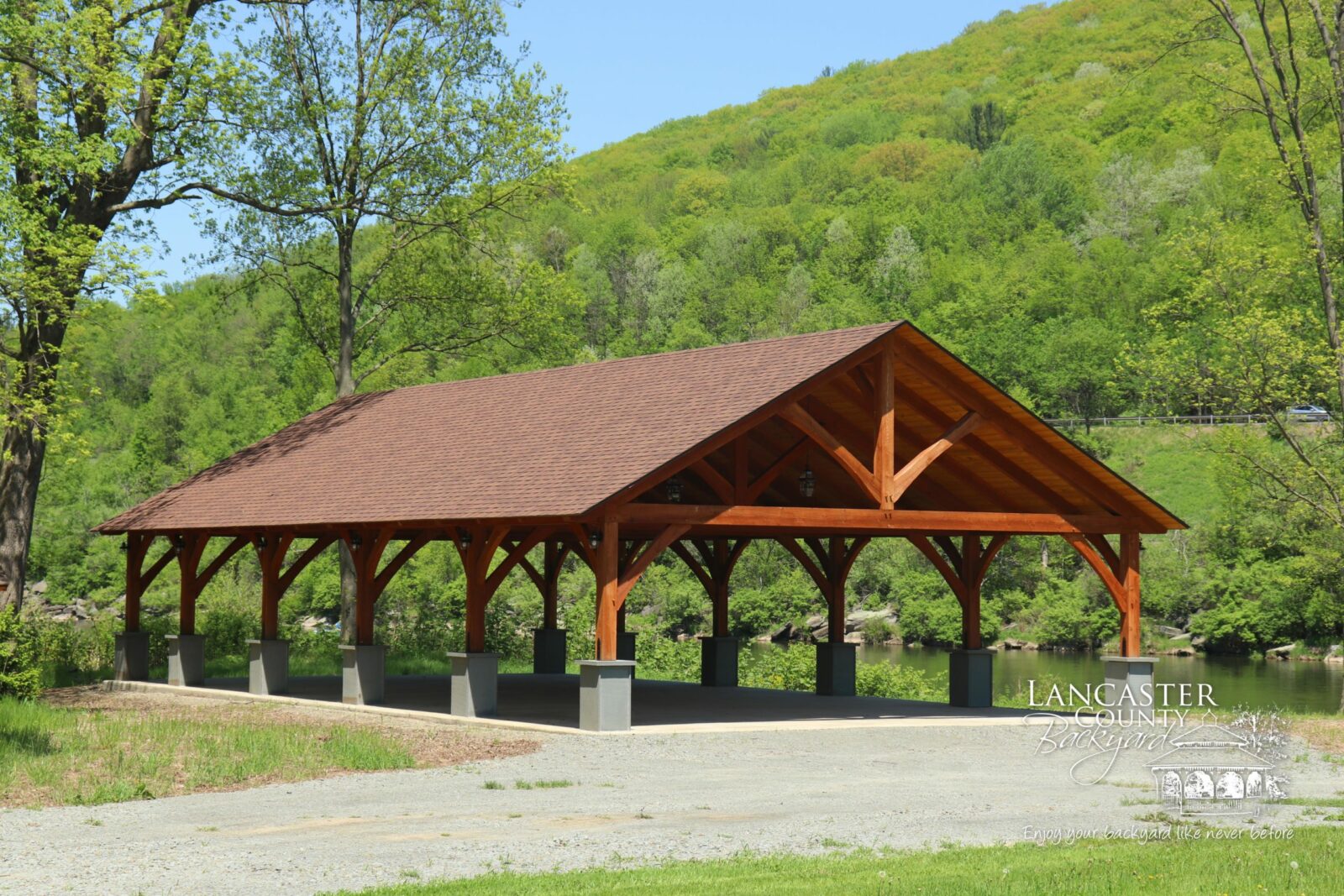 timber frame pavilion in a park